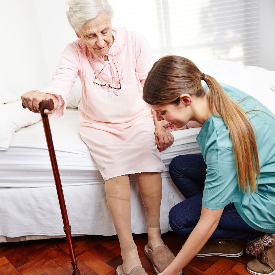 Live in Caregiver in Carrollton TX assisting Senior Woman with Dressing