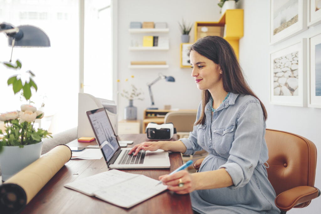 Lady Working at home on her computer