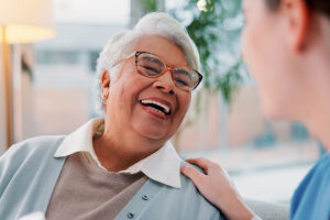 An elderly woman smiling