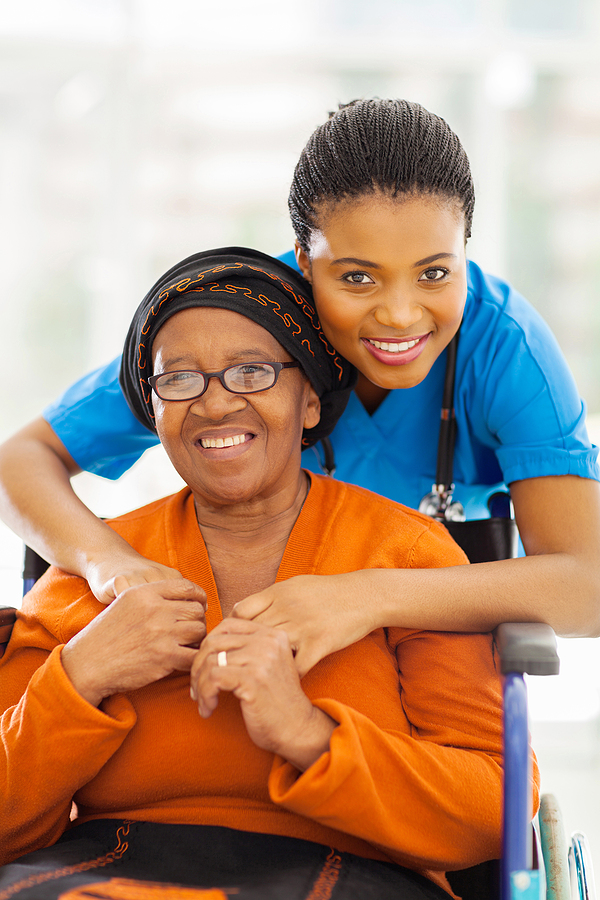 Caregiver and patient smiling