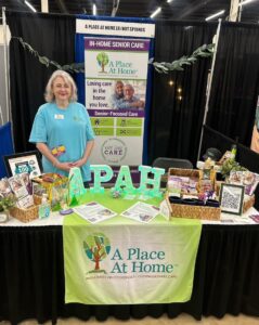women smile and greet at Expo