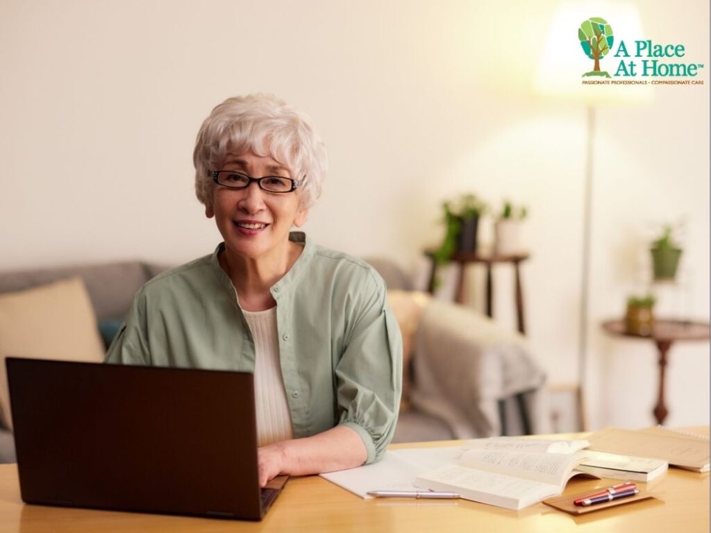 senior work on laptop