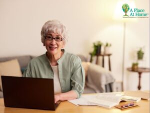 senior work on laptop