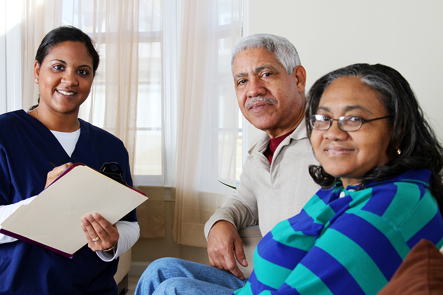 Home health care worker and an elderly couple