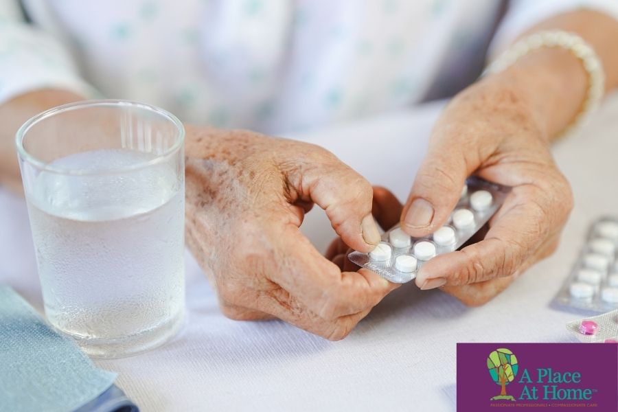 senior taking the medicine