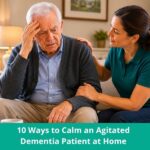 Senior man with dementia looking confused and anxious at home while caregiver offers calm support
