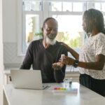 Senior couple having online medical consultation with doctor