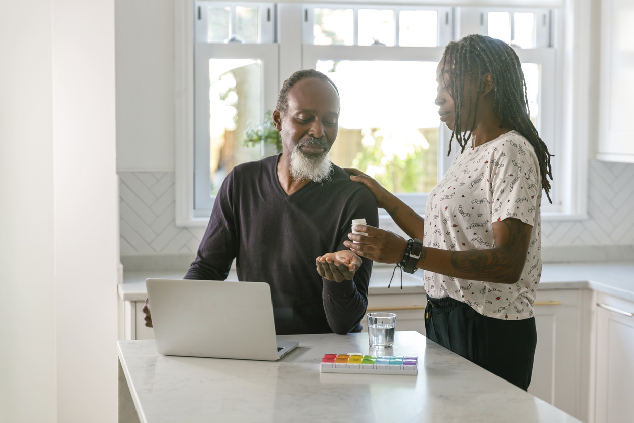 Senior couple having online medical consultation with doctor