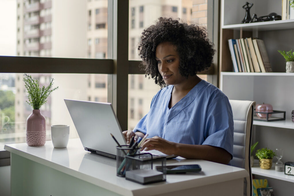 African American nurse working on the desk